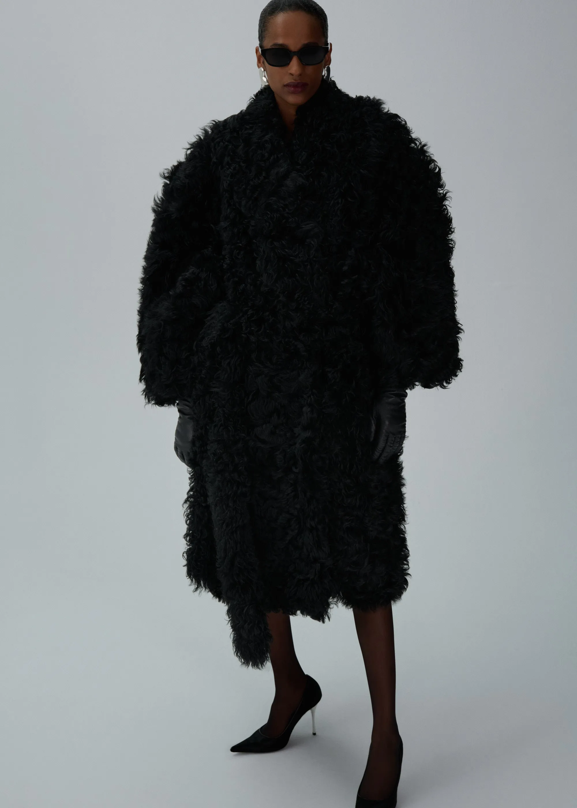 Shaggy shearling coat in black