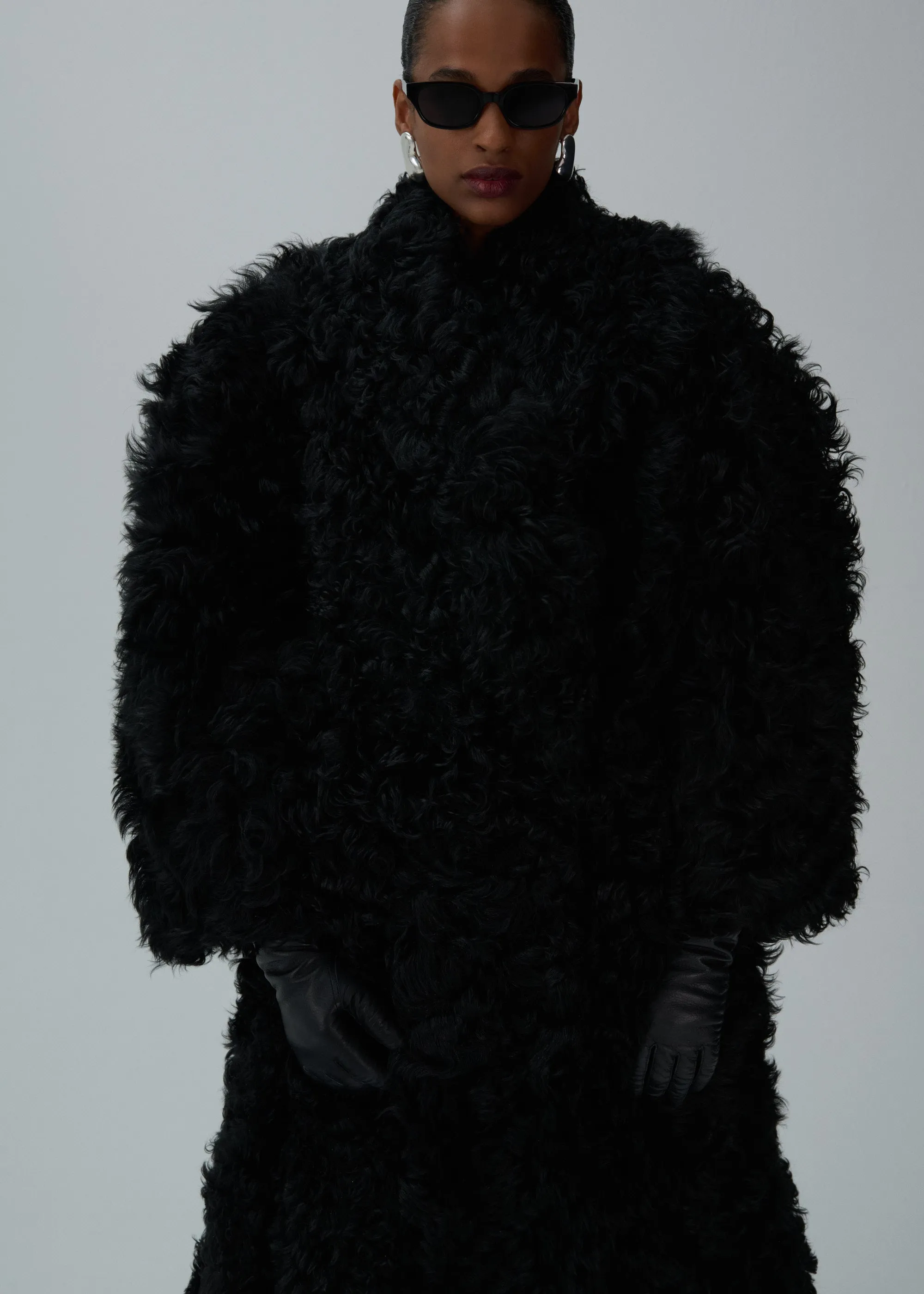 Shaggy shearling coat in black